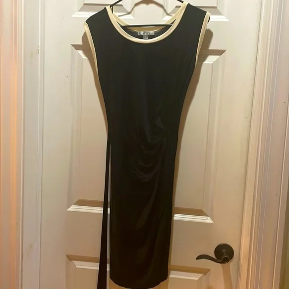 Black dress with cream trim. Ties on the side. **PRICE DROP!!**